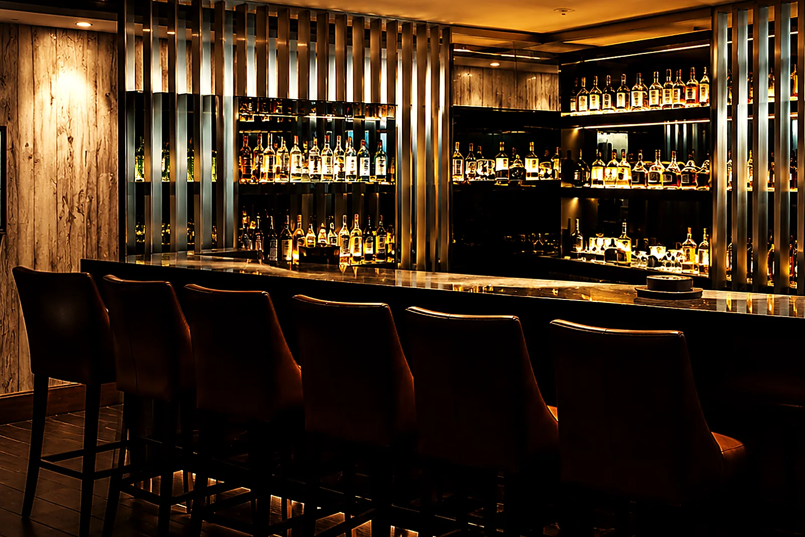 The Wild Woven bar and backlit bottle wall