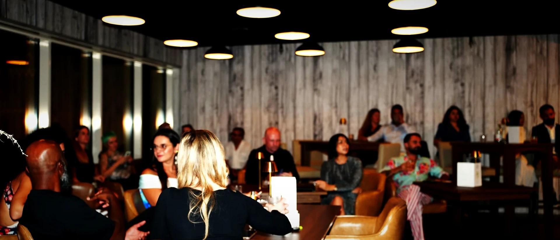 A full room of guests at Wild Woven Dubai