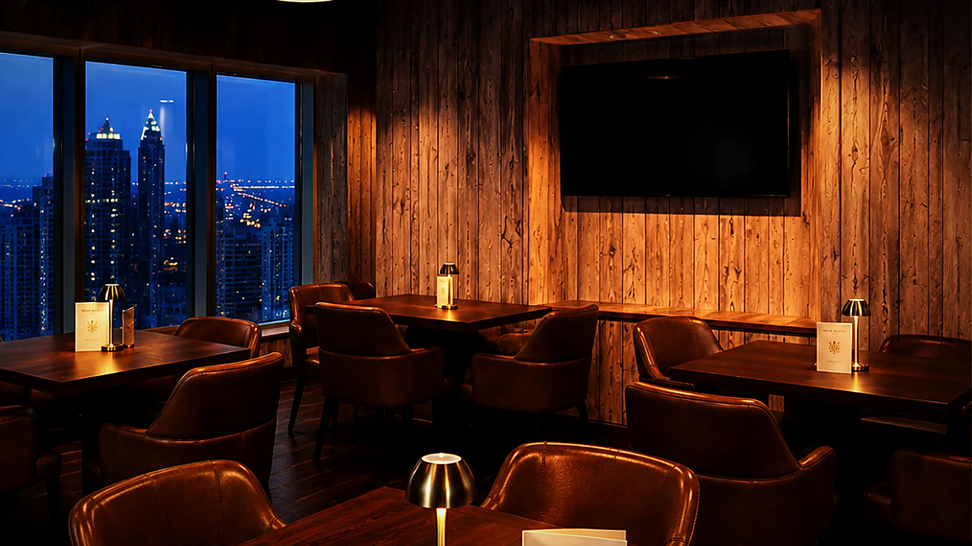 The Wild Woven dining room at night with the Dubai skyline behind